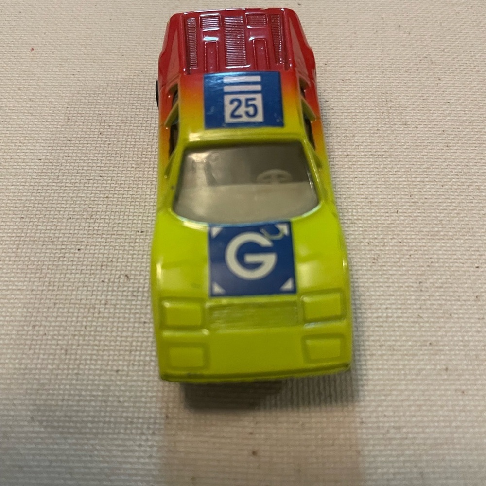 Red and Yellow Google Toy Car